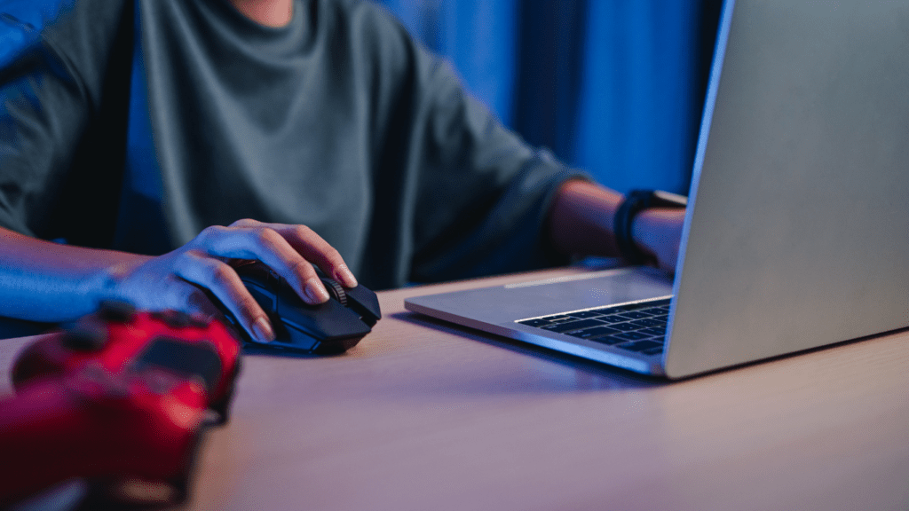 teenager using his laptop