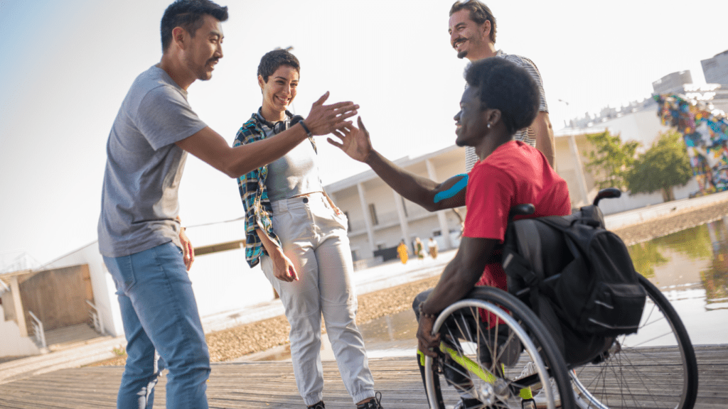 individuals cheering up a pwd