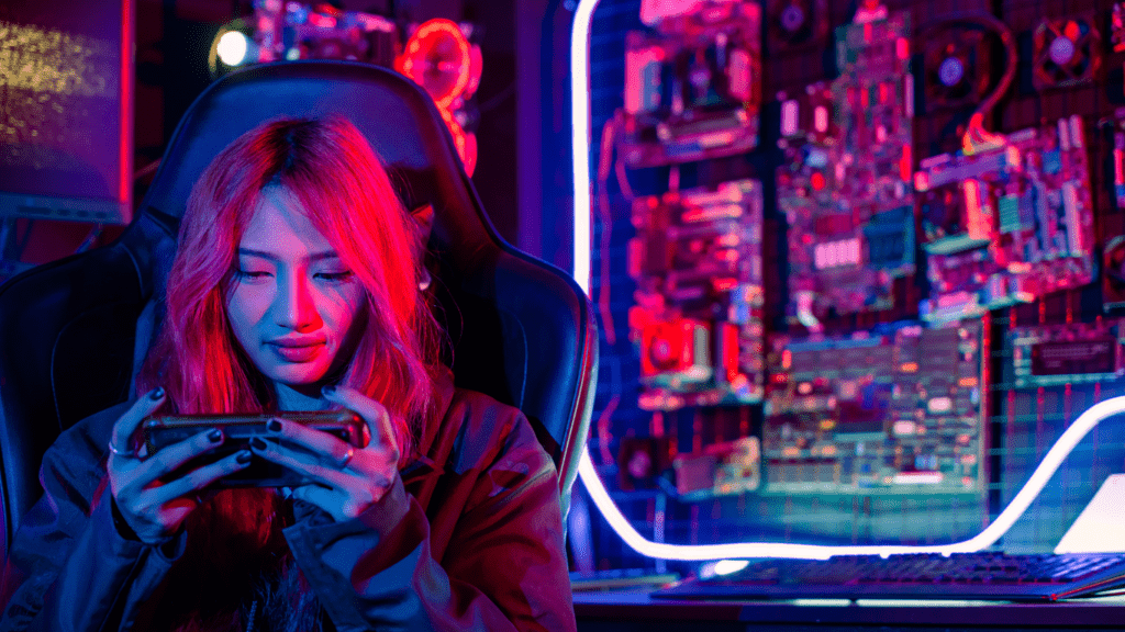 female gamer playing mobile game